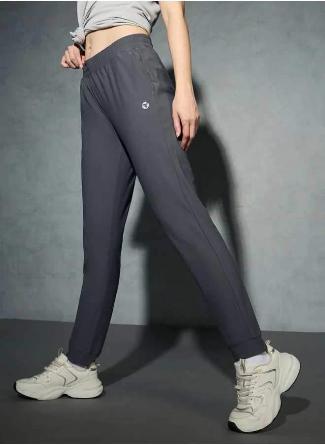 تكنوسبورت Logo Print 4-Way Stretch Joggers with Pockets by Styli