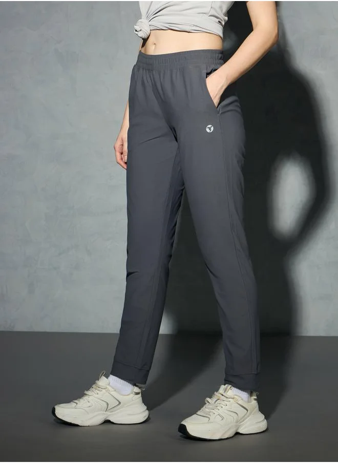 تكنوسبورت Logo Print 4-Way Stretch Joggers with Pockets by Styli