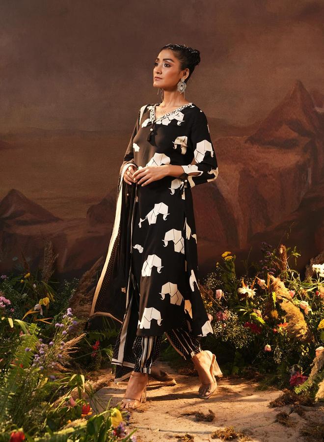 ISHIN Women's Black Rayon Printed Tunic Upper Calf Length Palazzo Bottom Straight Fit 3 Peice Kurta Set - Image 1