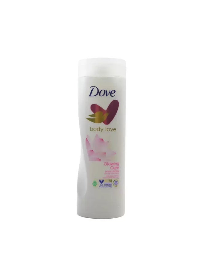Dove لوشن الجسم دوف بادي لوف للعناية المتألقة لجميع أنواع البشرة مع زيوت طبيعية، مستخلص زهرة اللوتس وحليب الأرز - 400 مل - Image 1