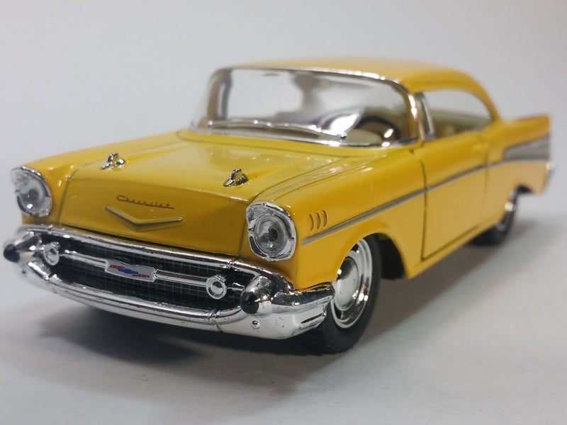 KiNSMART 5" Die-cast 1957 Chevy Bel Air Coupe (Yellow) - Image 1