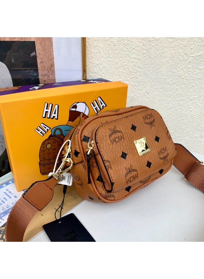 MCM Brown Monogrammed Camera Crossbody Bag with Adjustable Webbing Strap and Gold-tone Hardware