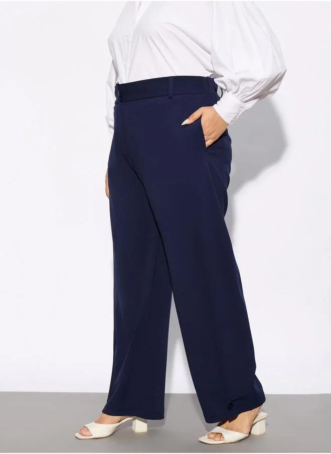 SASSAFRAS Plus Hem Button Detail Straight Pants by Styli