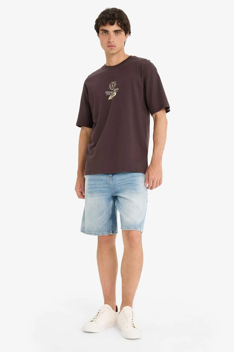ديفاكتو Boxy Fit Crew Neck Printed Short Sleeve T-Shirt