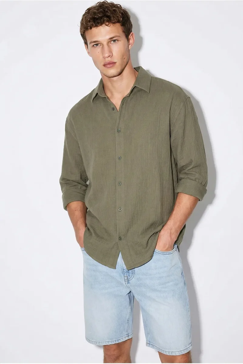 بيانكو لوتشي LUCCI Oversized Textured Button-Front Shirt