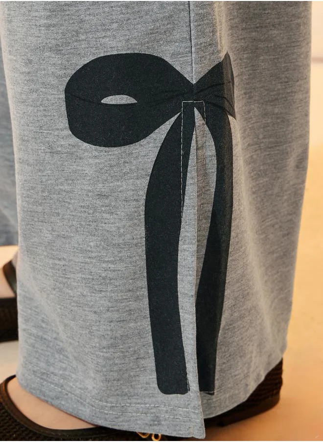 ستايلي Bow Print Detail Side Slit Wide Leg Pants