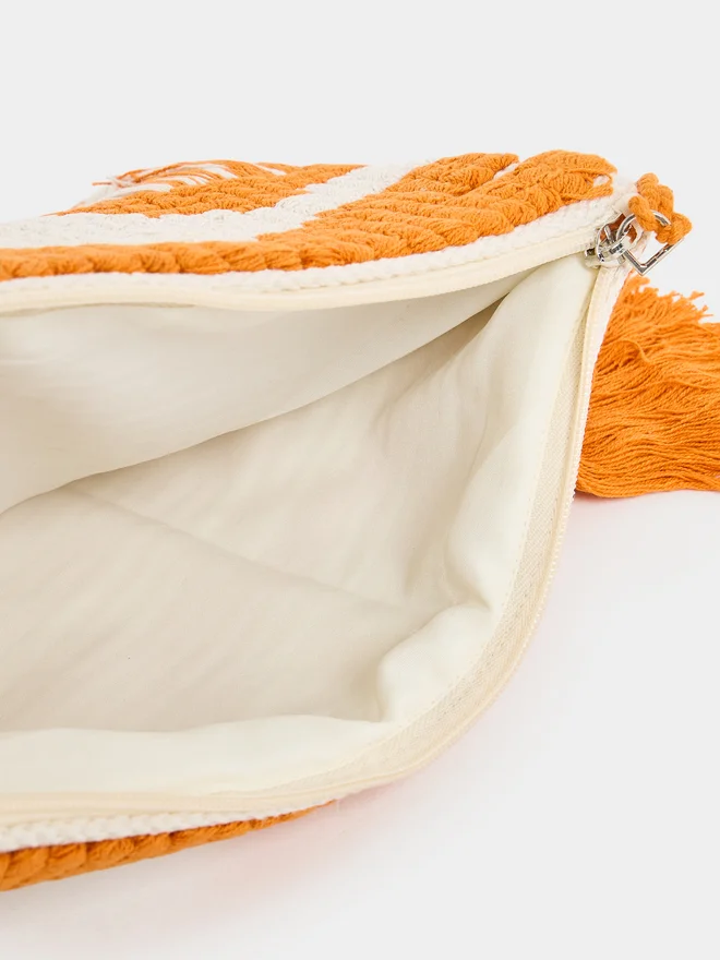 Styli Styli Pattern Fringe Clutch with Tassel Detail
