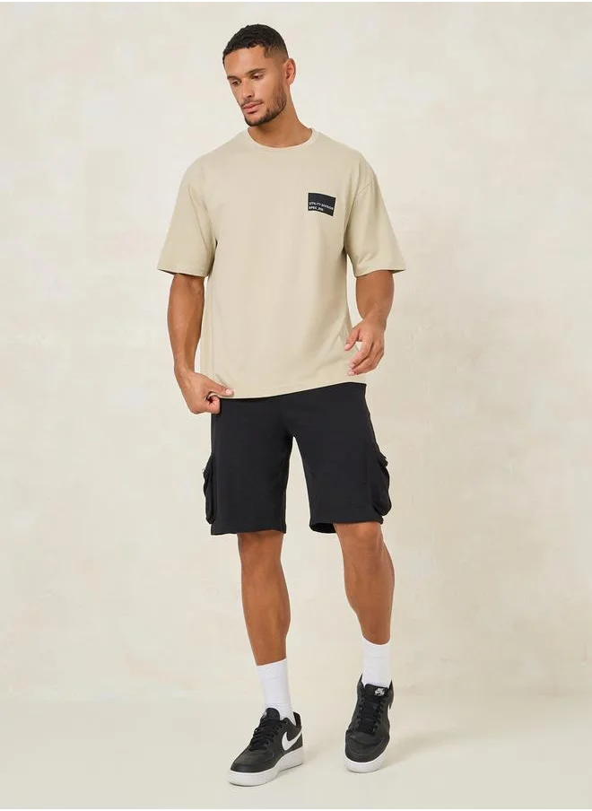 Styli Minimal Chest Sticker Print Oversized T-Shirt