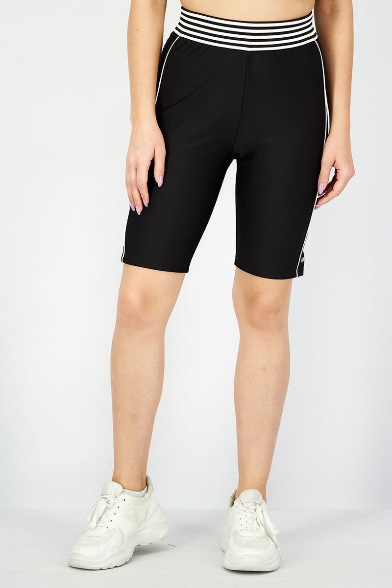 PUMA Women Athletic Fit Solid Basic Tight Shorts, Black - Image 1