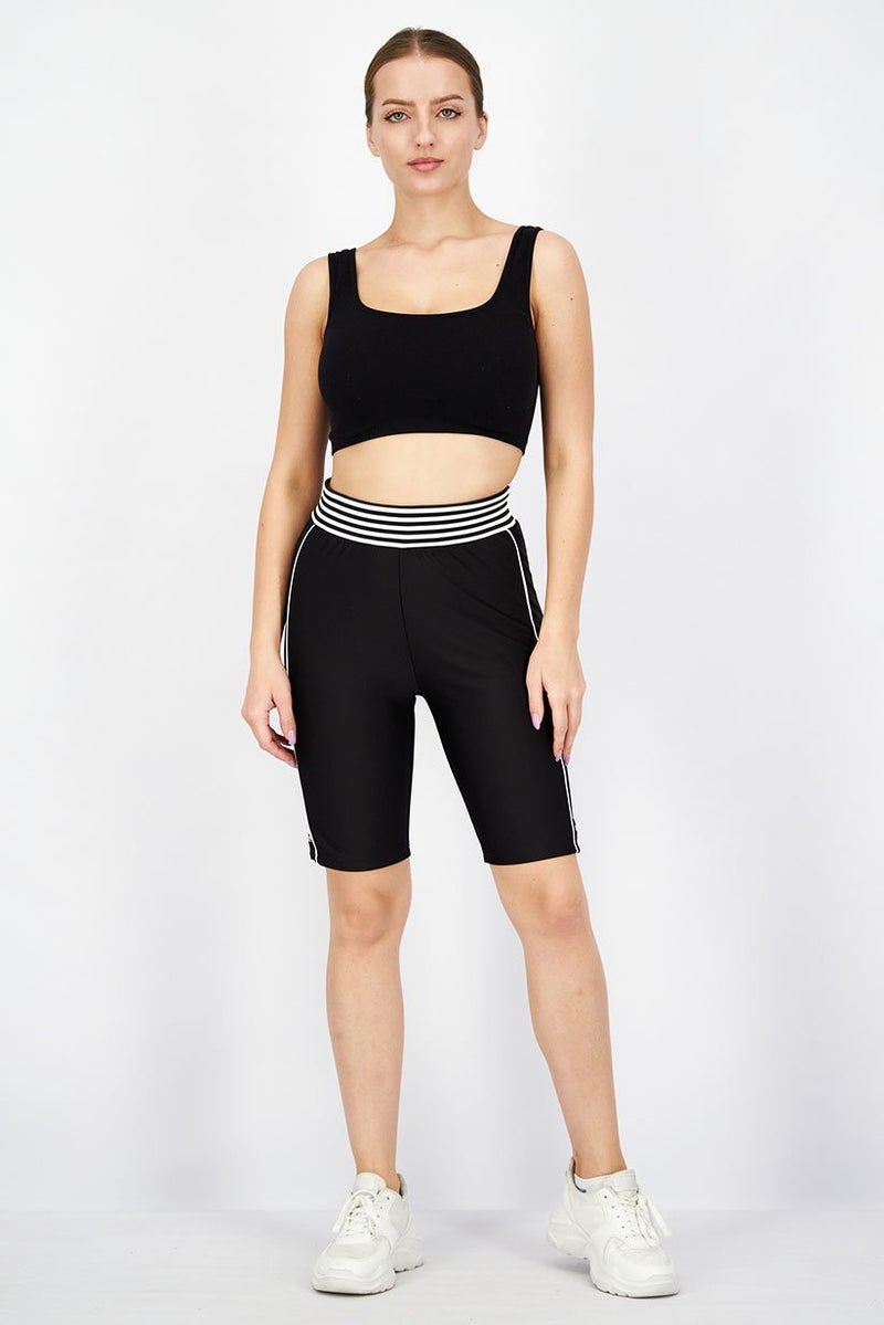 PUMA Women Athletic Fit Solid Basic Tight Shorts, Black - Image 4