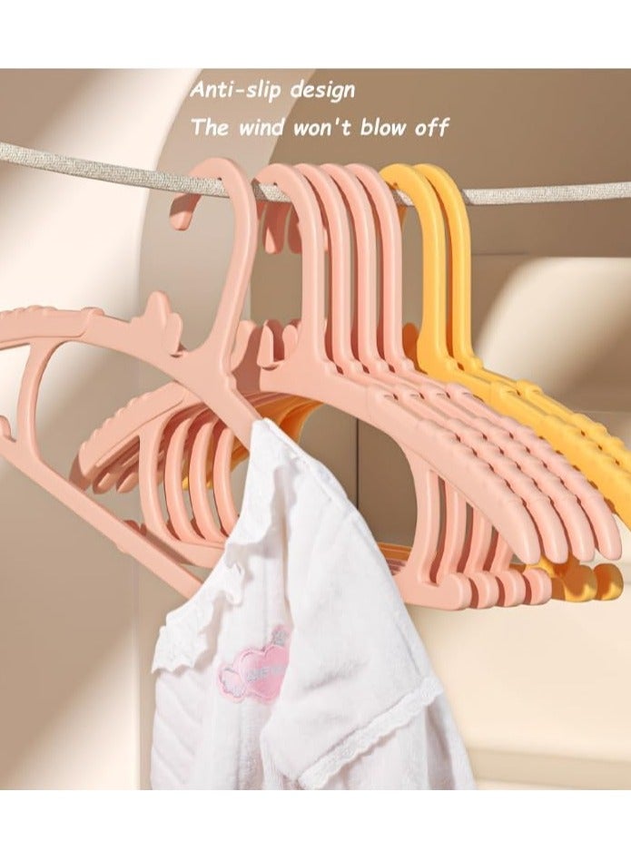 رات سو مشدات ملابس الأطفال 50 قطعة مشدات بلاستيكية لخزانة الأطفال مشدات للأطفال الصغار مع تصميم بلاستيكي رفيع وقوي غير قابل للانزلاق باللون الوردي - Image 2