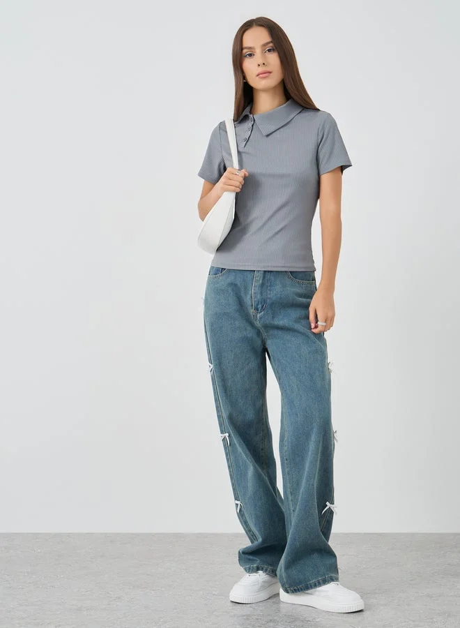 تايك تو توب بولو قصير بأكمام قصيرة بنقشة مميزة