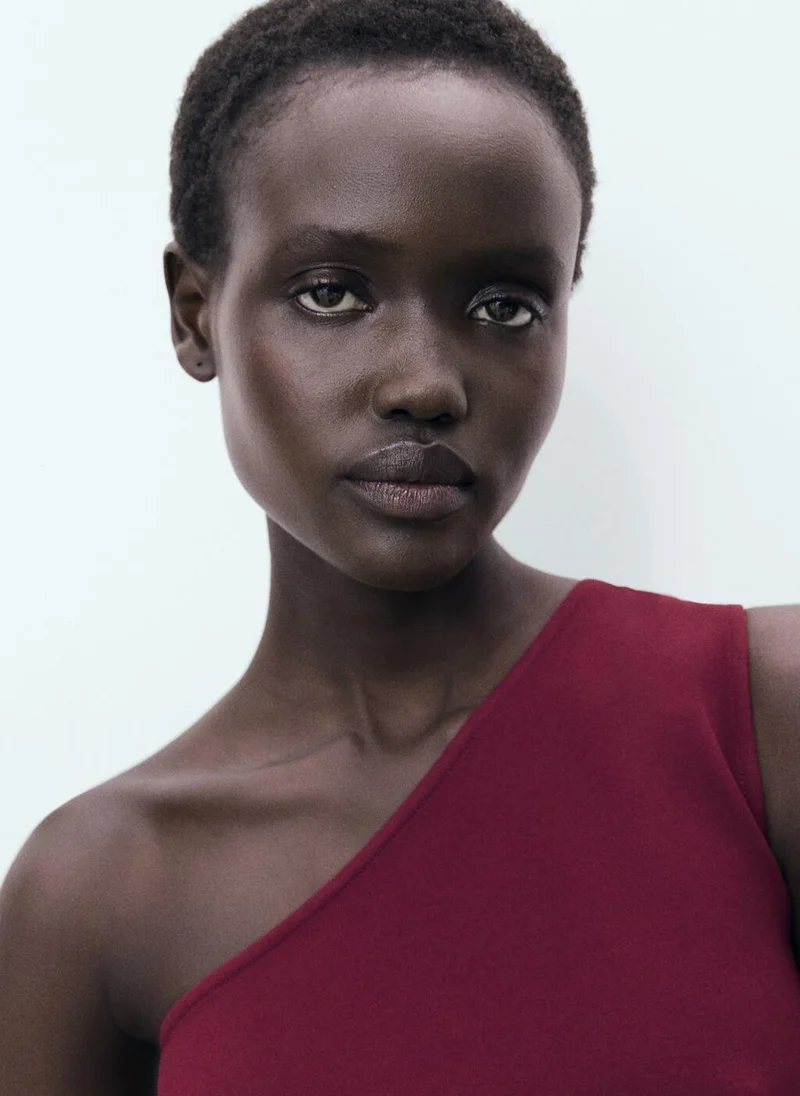 مانجو توب غير متماثل بكسرات