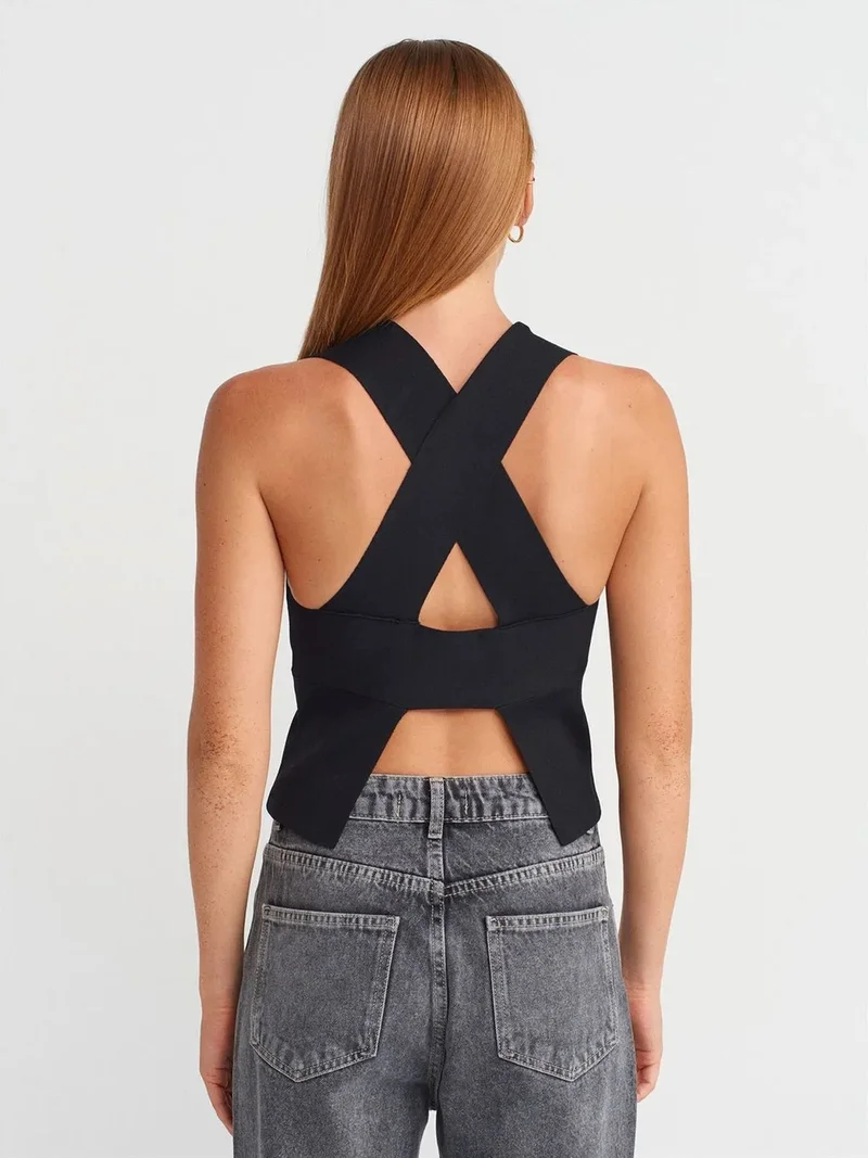 ديلفين Dilvin Sleeveless Cut-Out Knit Blouse