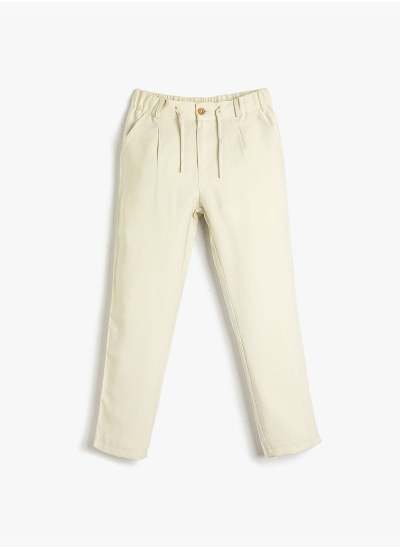 KOTON Trousers Drawstring and Elastic Waistband Slim Leg Pockets  - Image 1