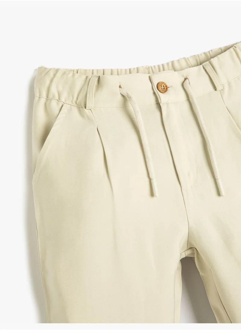 KOTON Trousers Drawstring and Elastic Waistband Slim Leg Pockets