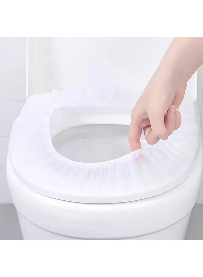 50 قطعة من أغطية مقاعد المرحاض البيضاء القابلة للتخلص مغلفة بشكل فردي، ضرورية للسفر ومقاومة للماء - Image 2