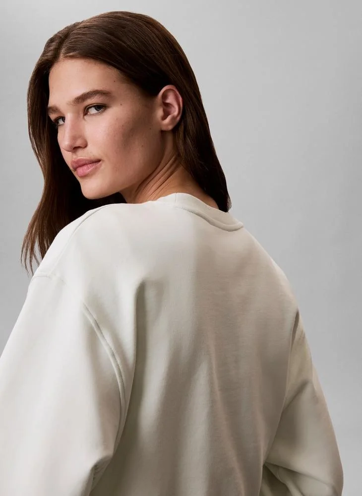 Calvin Klein Jeans Phantom Green Woven Label Crew Neck Sweatshirt for Women | Best Price UAE