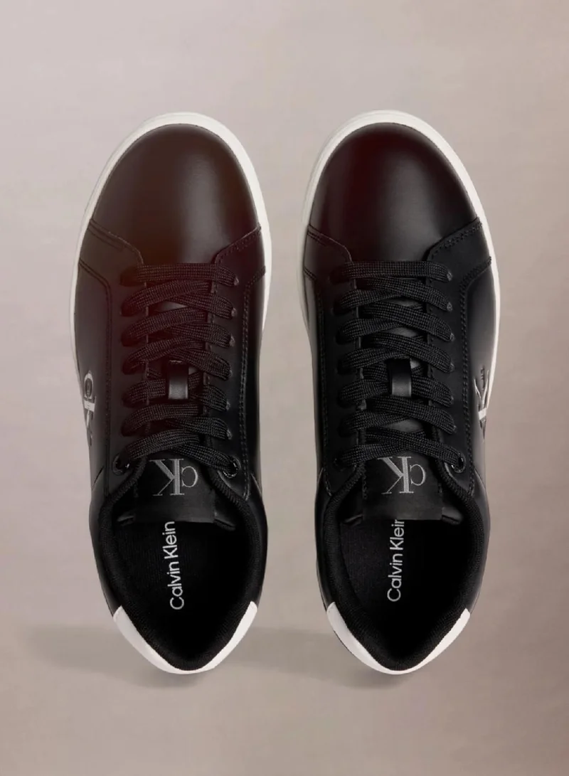Calvin Klein Black/Bright White Leather Trainers for Men | Best Price UAE