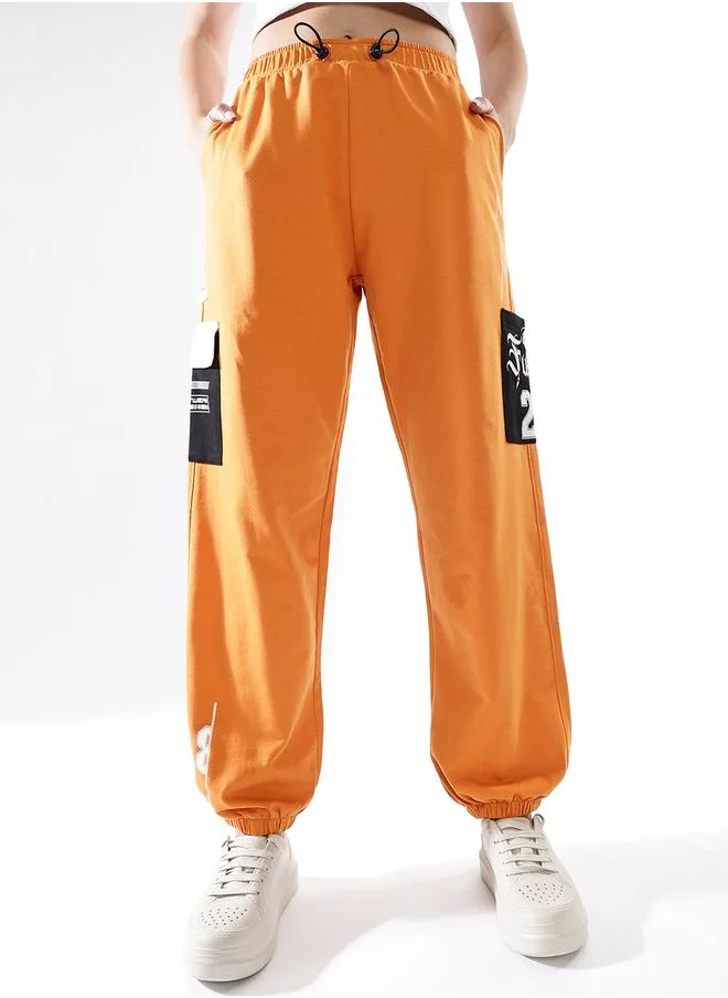 هوبرهولمي Women Track Pants in Multicolor featuring Jogger fit with a colourblocked pattern, no sleeves, regular length, secured with elasicated + drawstring closure, crafted from terry – an essential addition to your stylish collection.