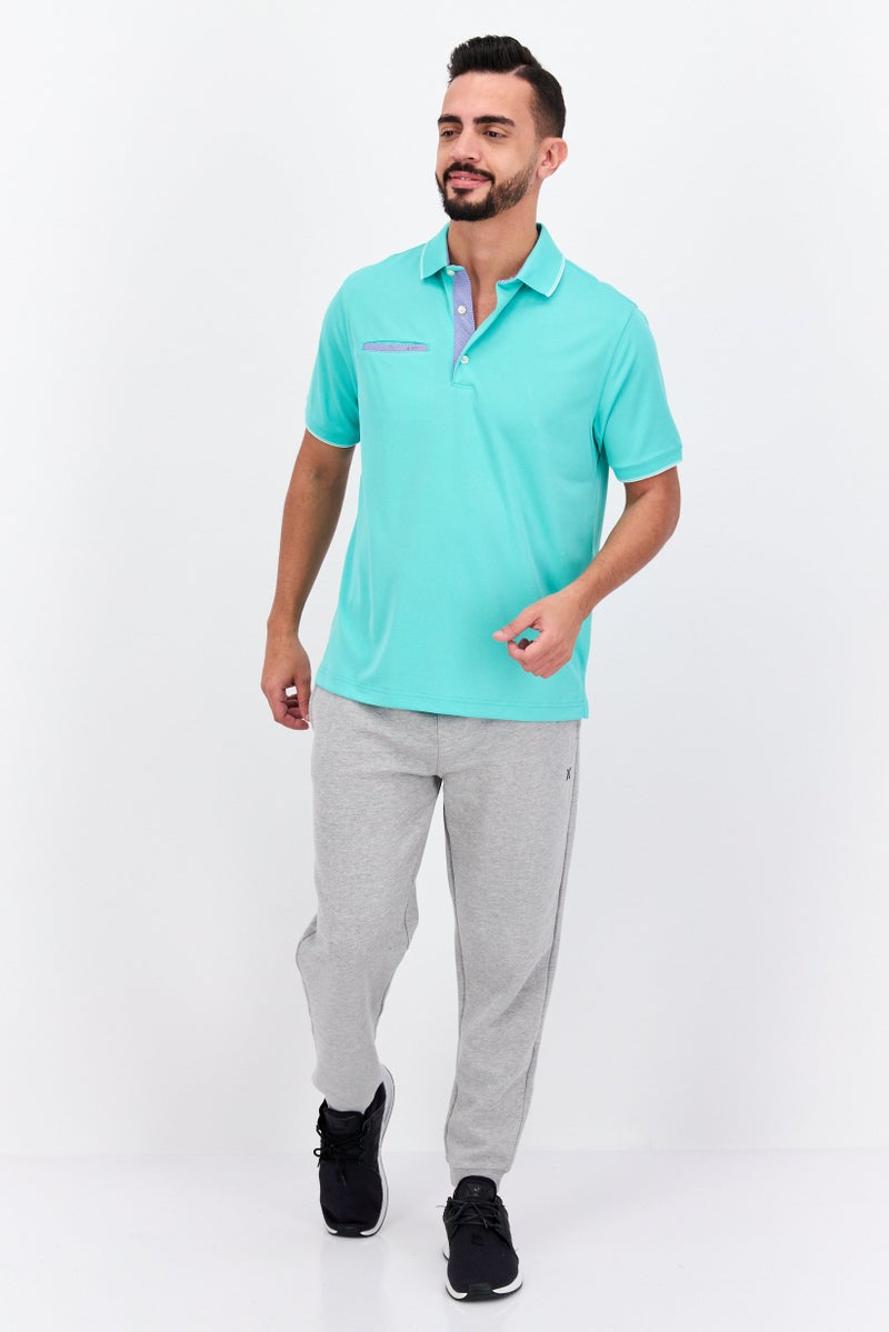 Greg Norman تي شيرت بولو قصير الأكمام للرجال بأداء متميز، أخضر باهت - Image 4