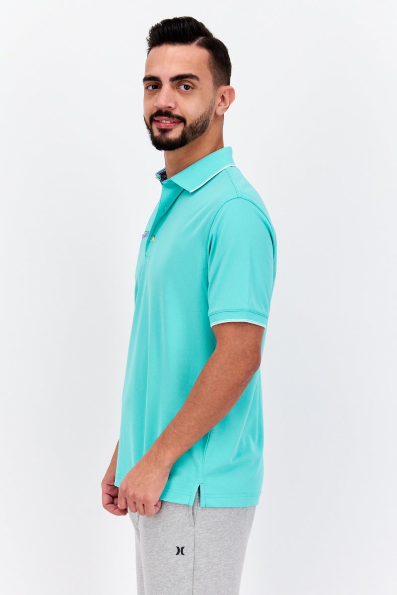 Greg Norman تي شيرت بولو قصير الأكمام للرجال بأداء متميز، أخضر باهت - Image 2