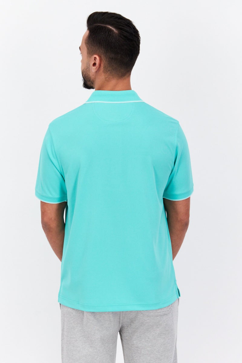 Greg Norman تي شيرت بولو قصير الأكمام للرجال بأداء متميز، أخضر باهت - Image 3