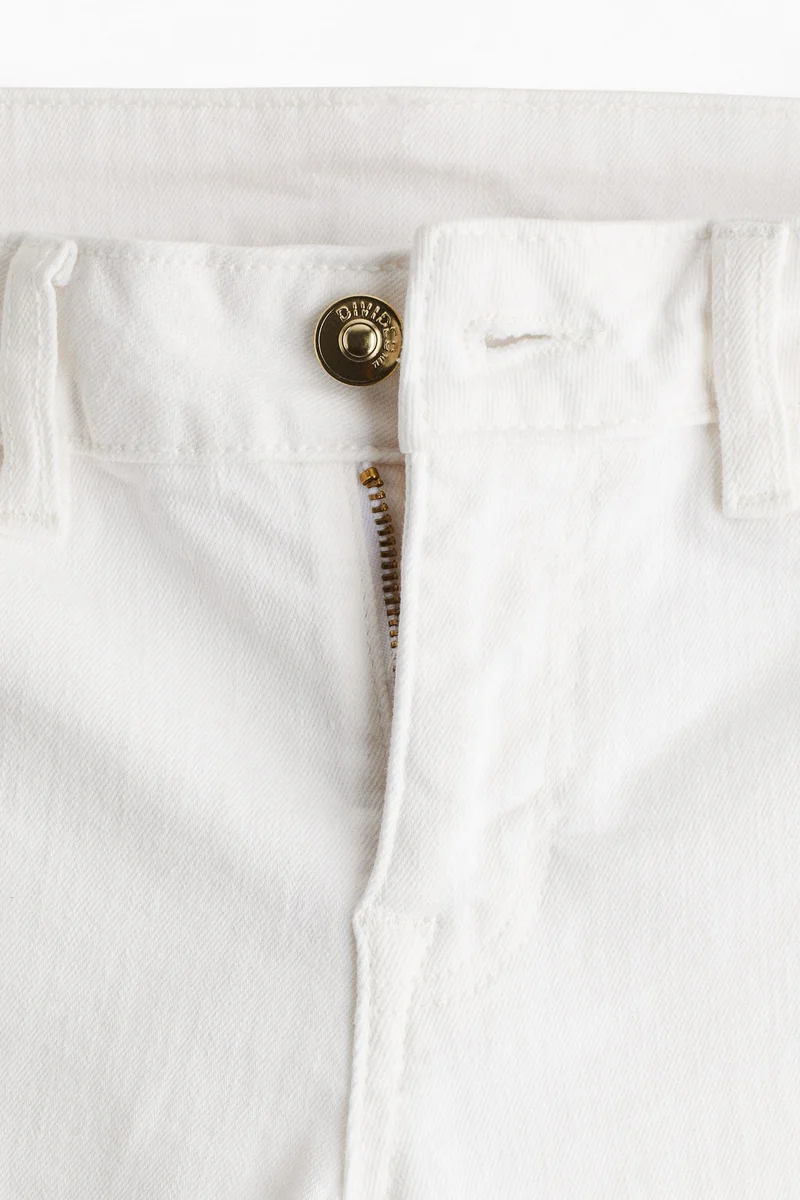 اتش اند ام جينز بحافة واسعة وبطول الكاحل بتصميم خصر منخفض