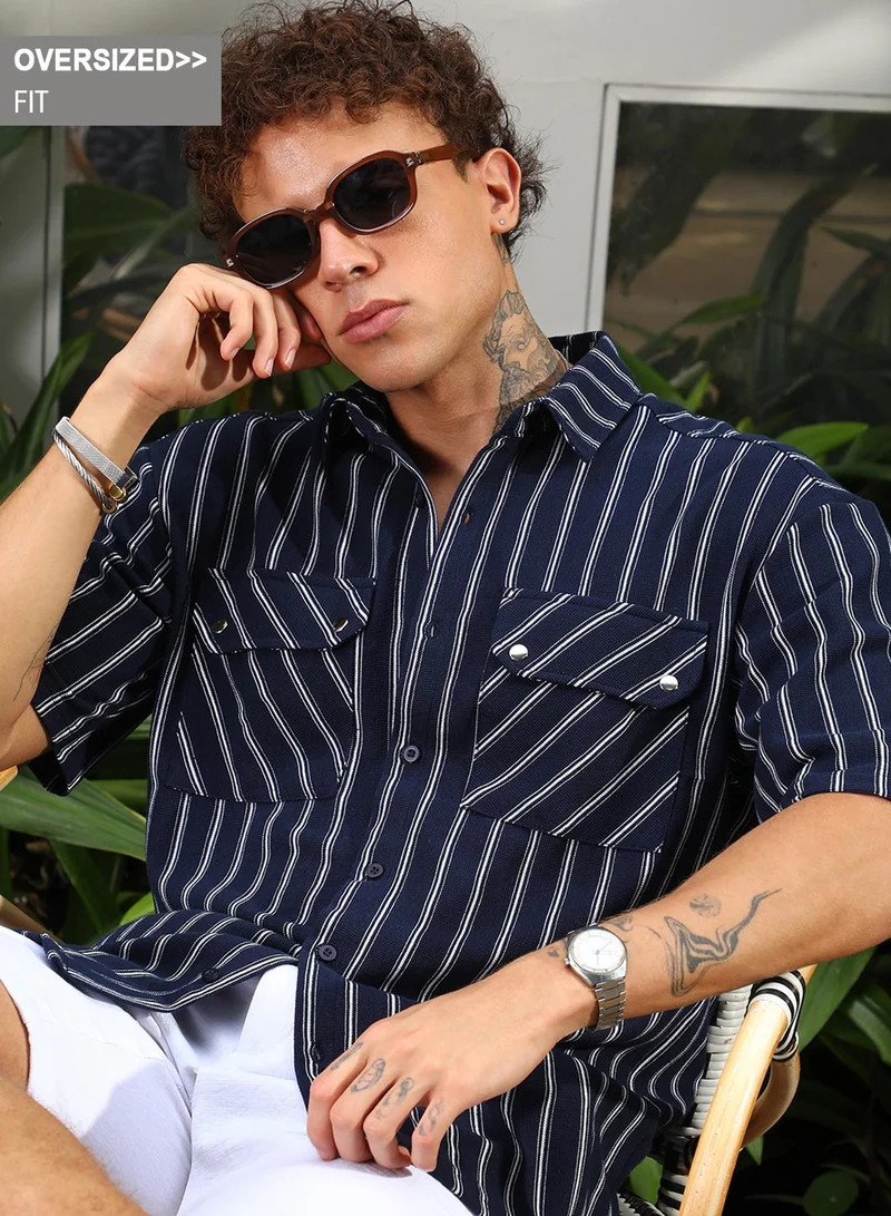 Campus Sutra Campus Sutra Men's Navy Blue Utility Halo-Stripe Oversized Shirt For Casual Wear | Spread Collar | Short Sleeve | Button Closure | Oversized Shirt Crafted With Comfort Fit For Everyday Wear