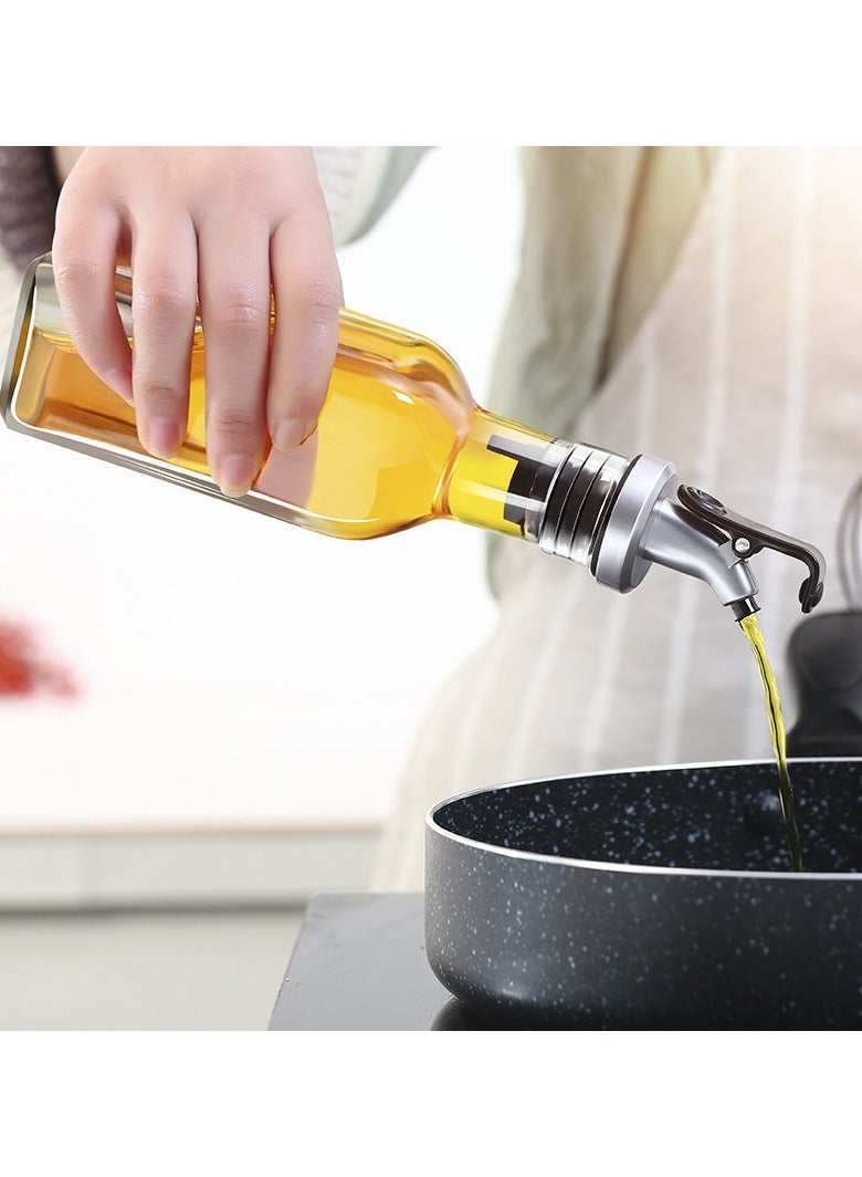 عام مجموعة مبتكرة من زجاجات التوابل المنزلية الزجاجية، مخصصة للتوابل الصلبة والسائلة، أدوات مطبخ أنيقة وعملية. - Image 3