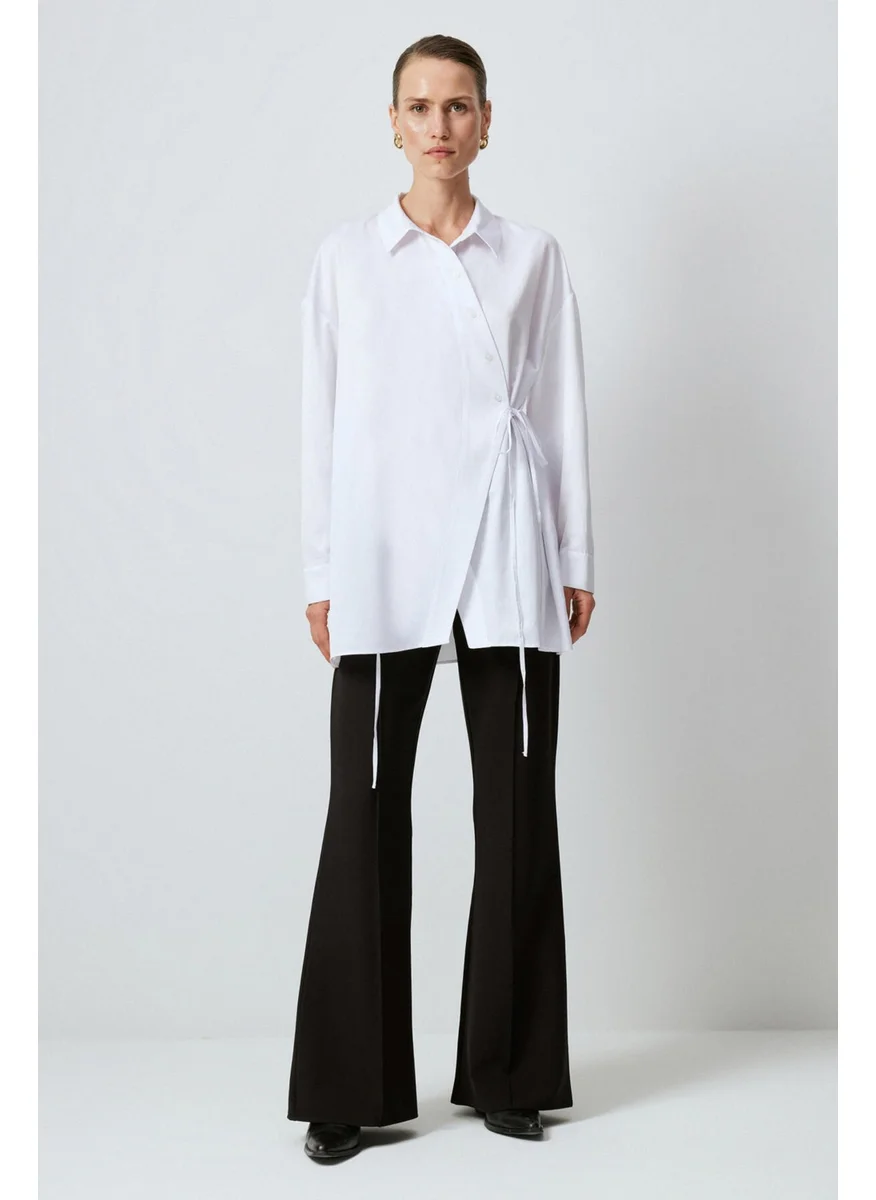 تاتشي Asymmetrical Cut Shirt with Waist Tie