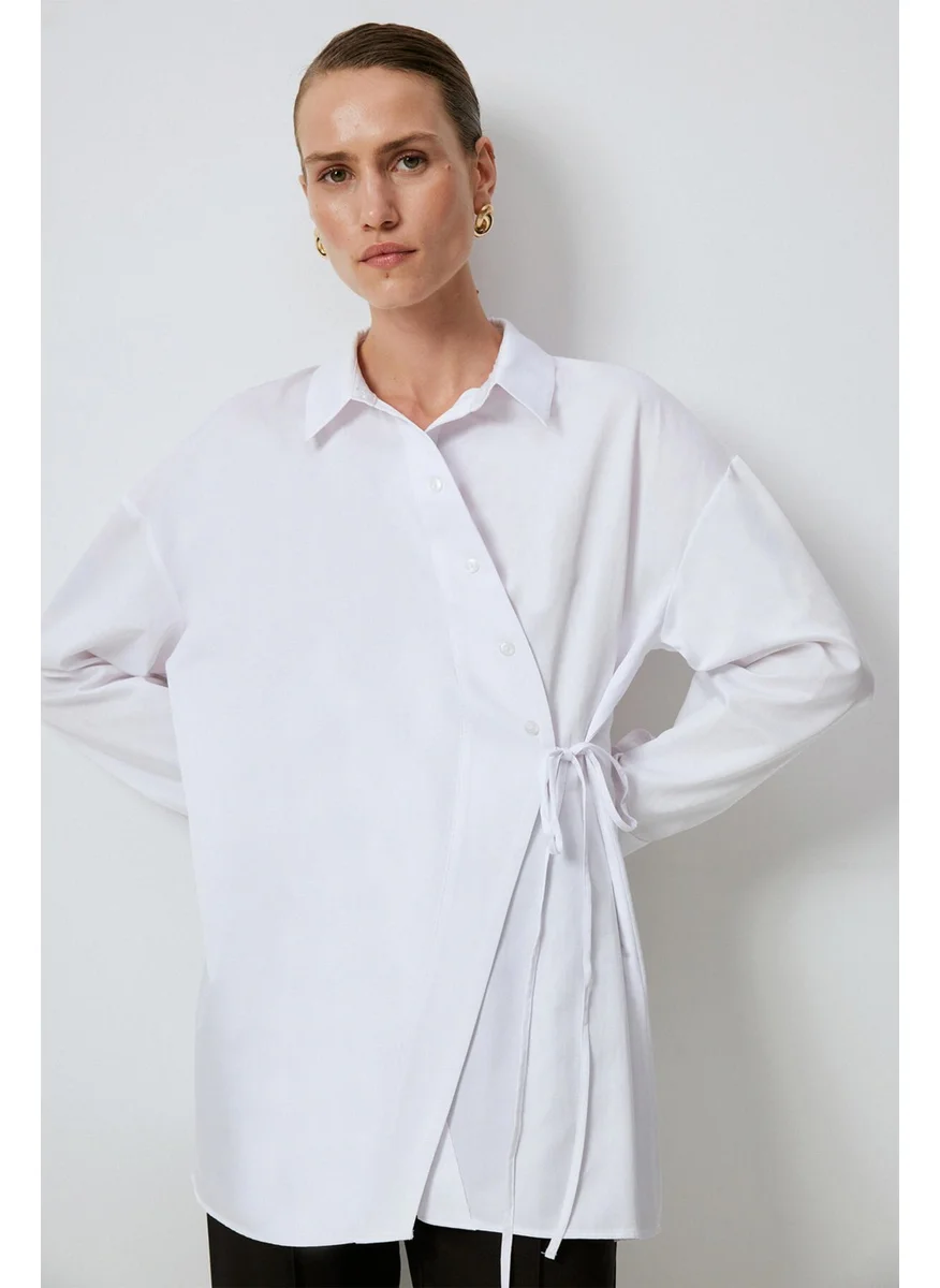 توتشي Asymmetrical Cut Shirt with Waist Tie