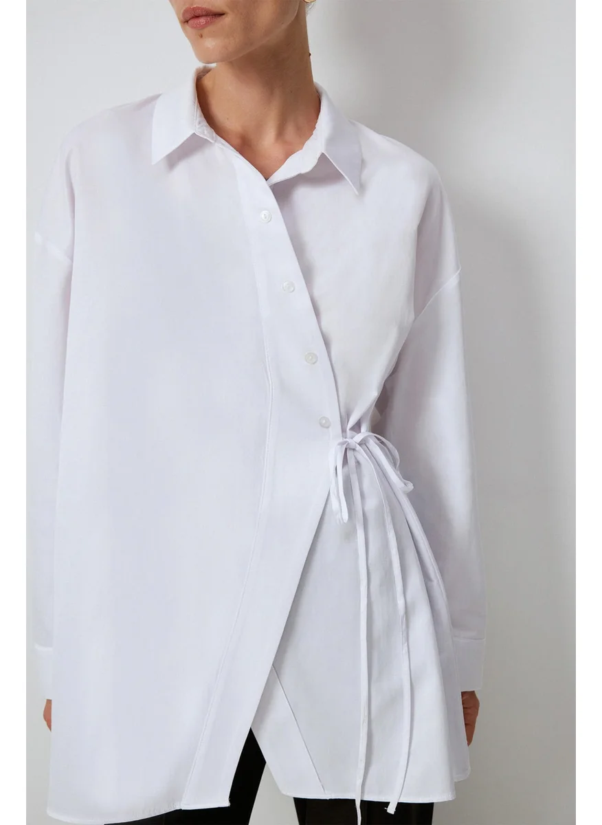 توتشي Asymmetrical Cut Shirt with Waist Tie
