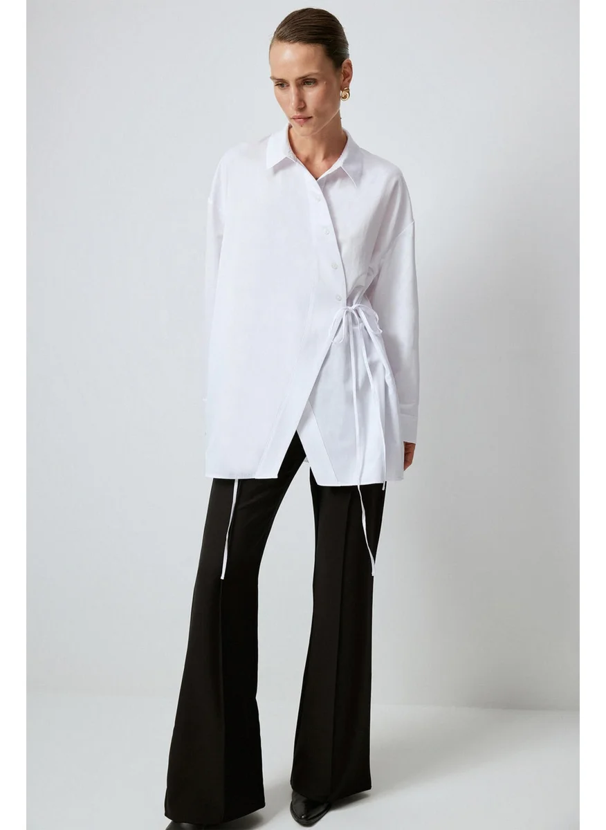 تاتشي Asymmetrical Cut Shirt with Waist Tie