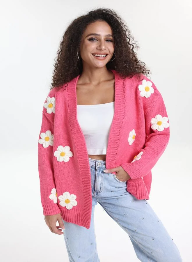 تايك تو كارديجان محبوك بمقاس كبير وزهور مُطرّزة