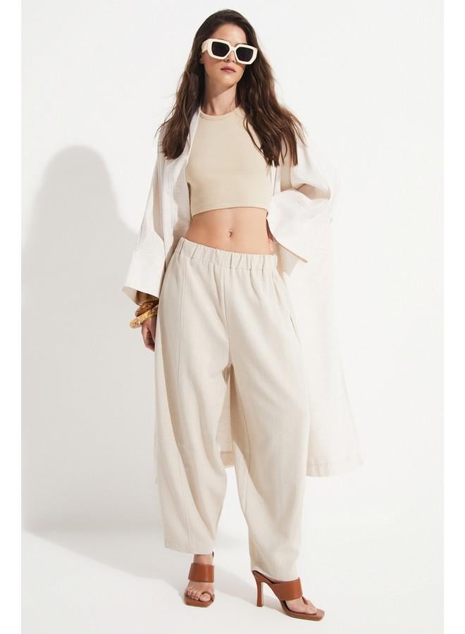 جون بنطلون قطن بمقاس مرن بلون حجري من جونيور - Image 1