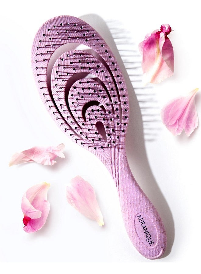 Keranique Detangling Hair Brush for Women - Gentle Scalp Massaging Hairbrush for Women With Flexible Paddle - Detangler Brush for Thin, Thick, Curly, Straight, and All Other Womens Hair Types by Keranique - Image 1