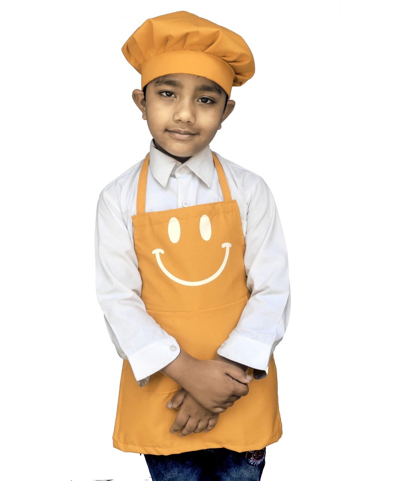 Switchon Polyester Waterproof Adjustable Kids Multi purpose Cooking Apron with a chef cap School Apron - Proudly made in india (Gold, 6Yrs to 11 Yrs) - Image 1