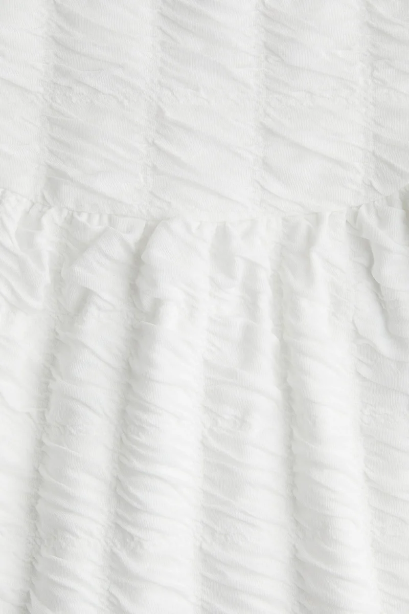 اتش اند ام فستان من الجيرسيه بارز الملمس