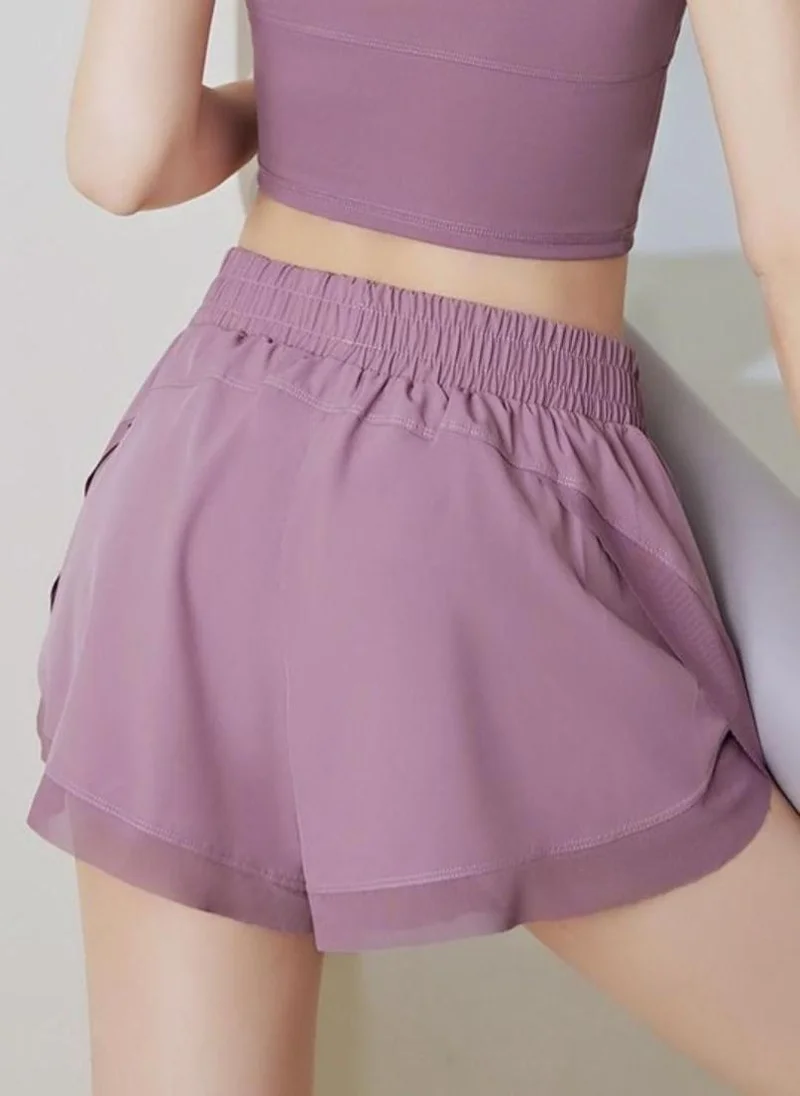 YUNIQEE Peach solid mid-rise yoga sports shorts