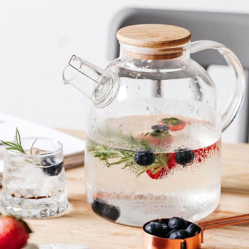 RADHIKA STORE RADHIKA STORE Glass Water Jug 1800 ml Carafe Pitcher with Stainless Steel Infuser Lid and Spout Heat Resistant Pitcher for HotCold Water Bottle Milk Juice Iced Tea 1 Pcs Clear - Image 3