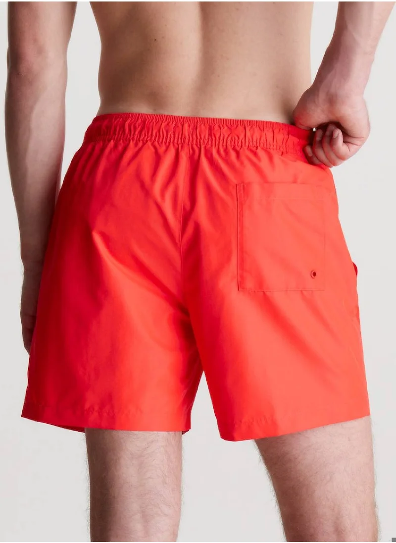 CALVIN KLEIN Men's Medium Drawstring Swim Shorts - Intense Power -  medium length, Red