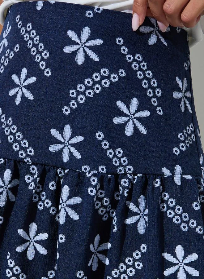 Styli  Blue Floral Embroidery Jacquard Fabric Pleated A-Line Maxi Skirt for Women | Best Price UAE