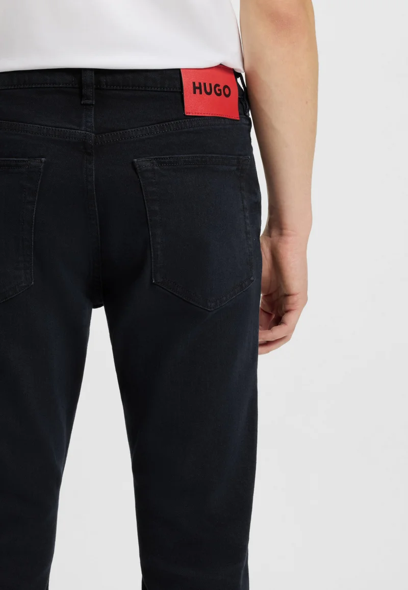 HUGO Dark Blue Extra-slim-fit jeans in blue-black denim for Men | Best Price UAE