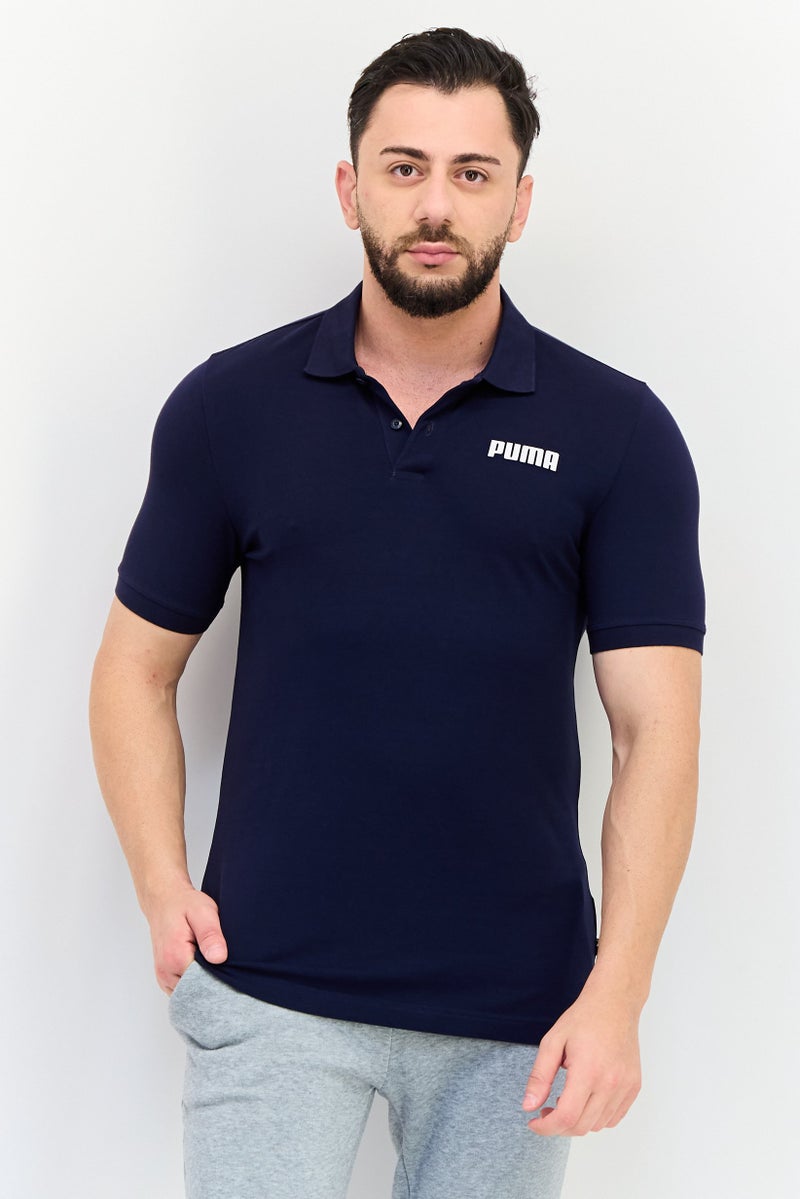 PUMA Men Sportswear Fit Short Sleeves Outdoor Polo Shirt, Navy - Image 1