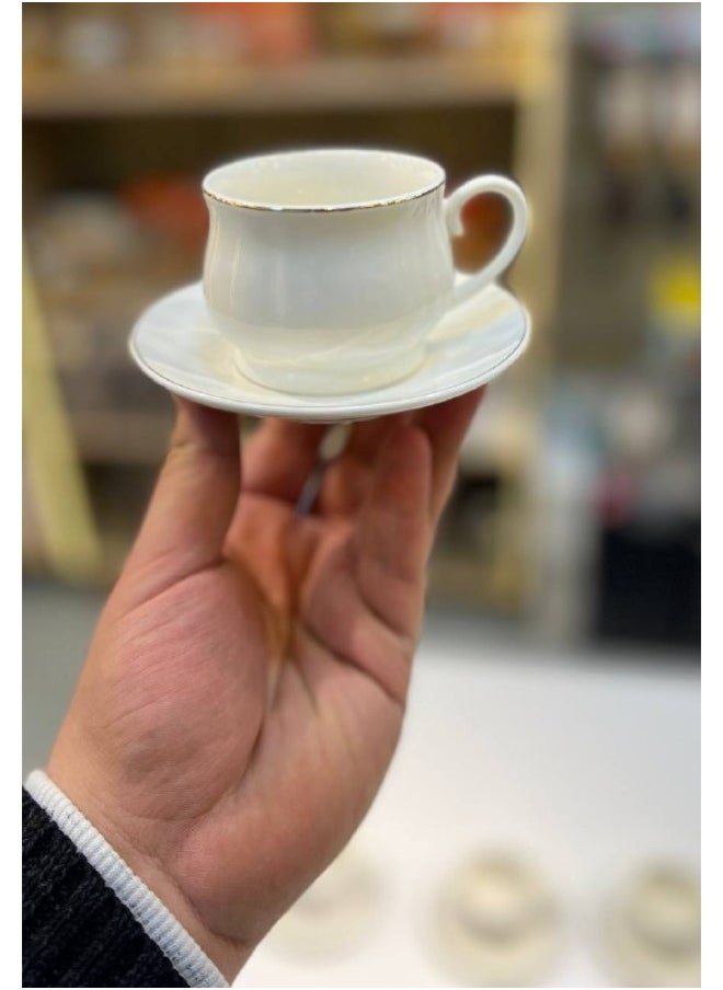 Porcelain coffee cup set. The set consists of 12 pieces: 6 cups and 6 saucers.