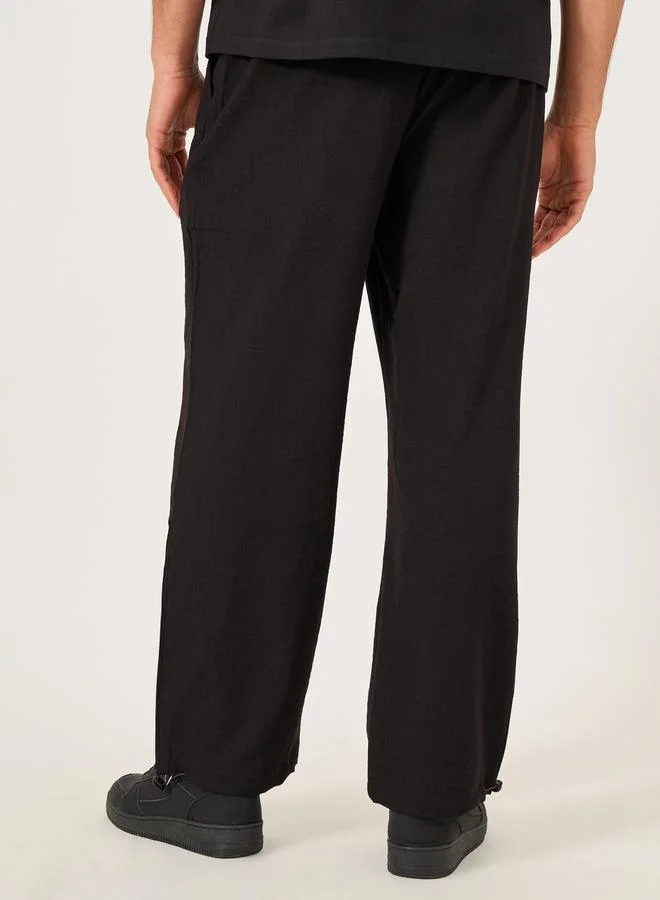 Take Two Solid Drawstring Waist Relaxed Fit Pants with Chain Detail by Styli