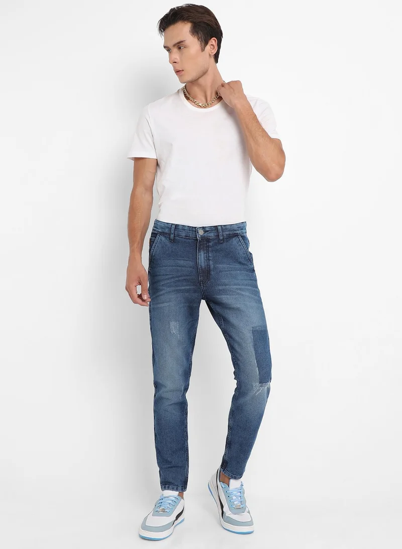 Campus Sutra  Men's Blue Distressed Patterned Denim Jeans for Men | Best Price UAE