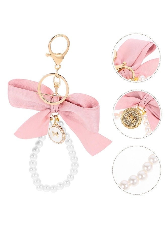 سلسلة مفاتيح على شكل فيونكة من قطعتين، سلسلة مفاتيح لطيفة على شكل معصم من اللؤلؤ لمفاتيح السيارة، إكسسوارات سلسلة مفاتيح على شكل فيونكة، للنساء والفتيات، حقائب اليد، حقائب الظهر، المحفظة، أساور سلسلة المفاتيح اللطيفة - Image 4