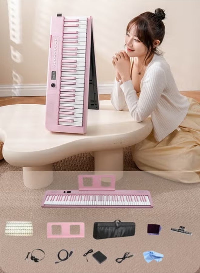 والالا بيانو ذكي MIDI قابل للطي بالحجم الكامل للمبتدئين والبالغين، بيانو إلكتروني محمول متعدد الوظائف قابل لإعادة الشحن مع دواسة استدامة للبيانو الإلكتروني 88 مفتاحًا وحقيبة بيانو، سماعات أذن كبيرة، دواسة استدامة، مشبك موسيقى، قماش بيانو، غطاء بيانو 88، ورقة موسيقية 88، كابل OTG، كابل صوت، وردي 3.8 كجم - Image 1